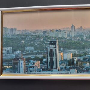 Настінна картина (фото) в рамці з фотографією панорама Києва у вечірній час.