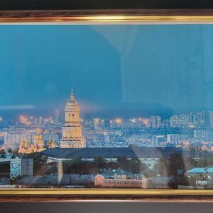 Настінна картина (фото) в рамці з фотографією панорама Києва у вечірній час.
