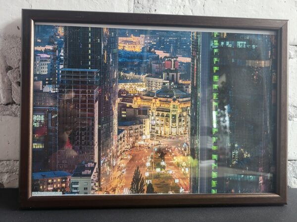 Настінна картина (фото) в рамці з фотографією панорама Києва у вечірній час.
