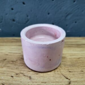 підсвічник з бетону для свічки таблетки. виріб покрито лаком. колір рожевий