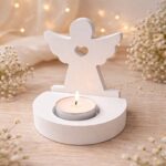 ангел на підставці з бетону. колір білий